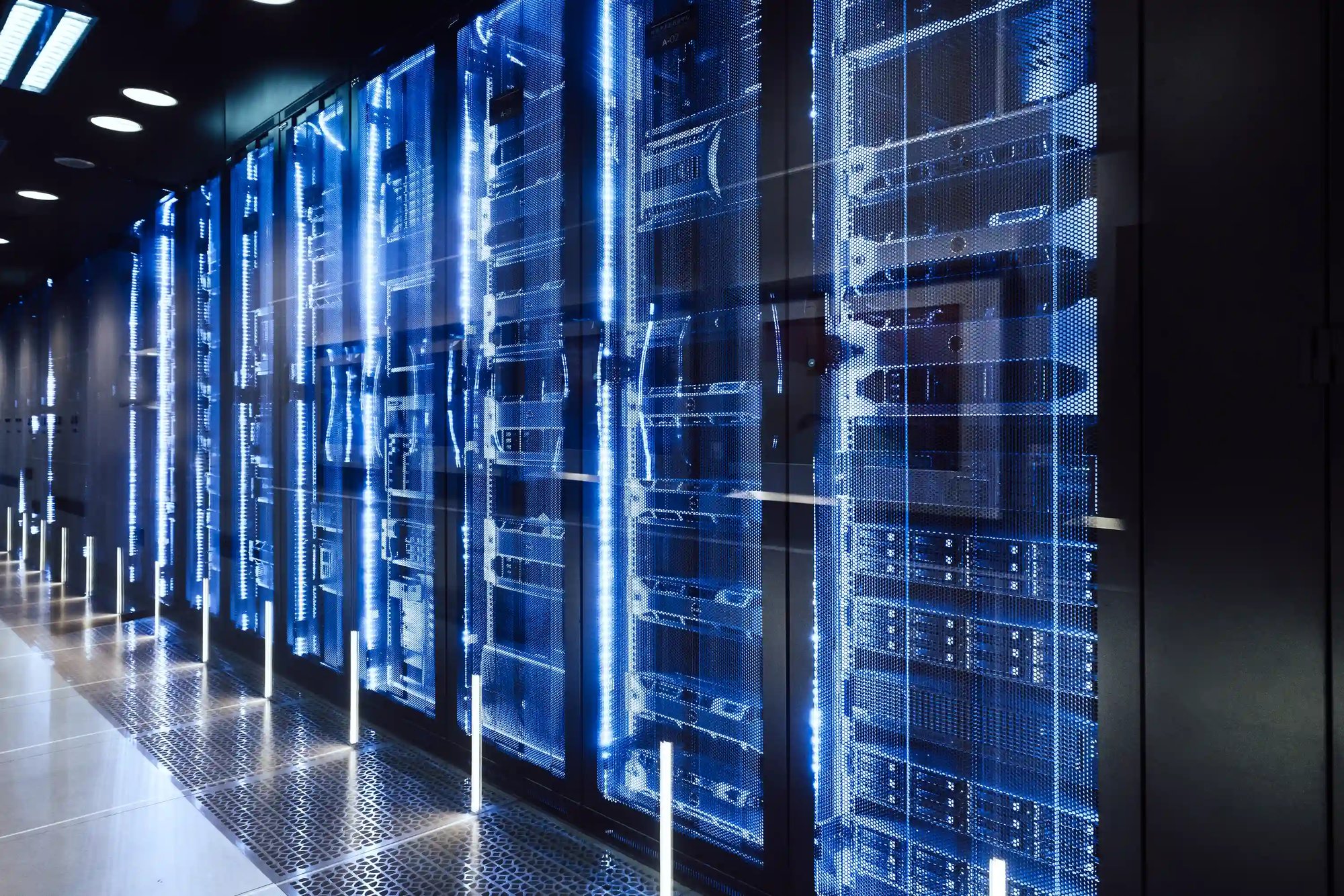 Data banks in blue light behind security doors
