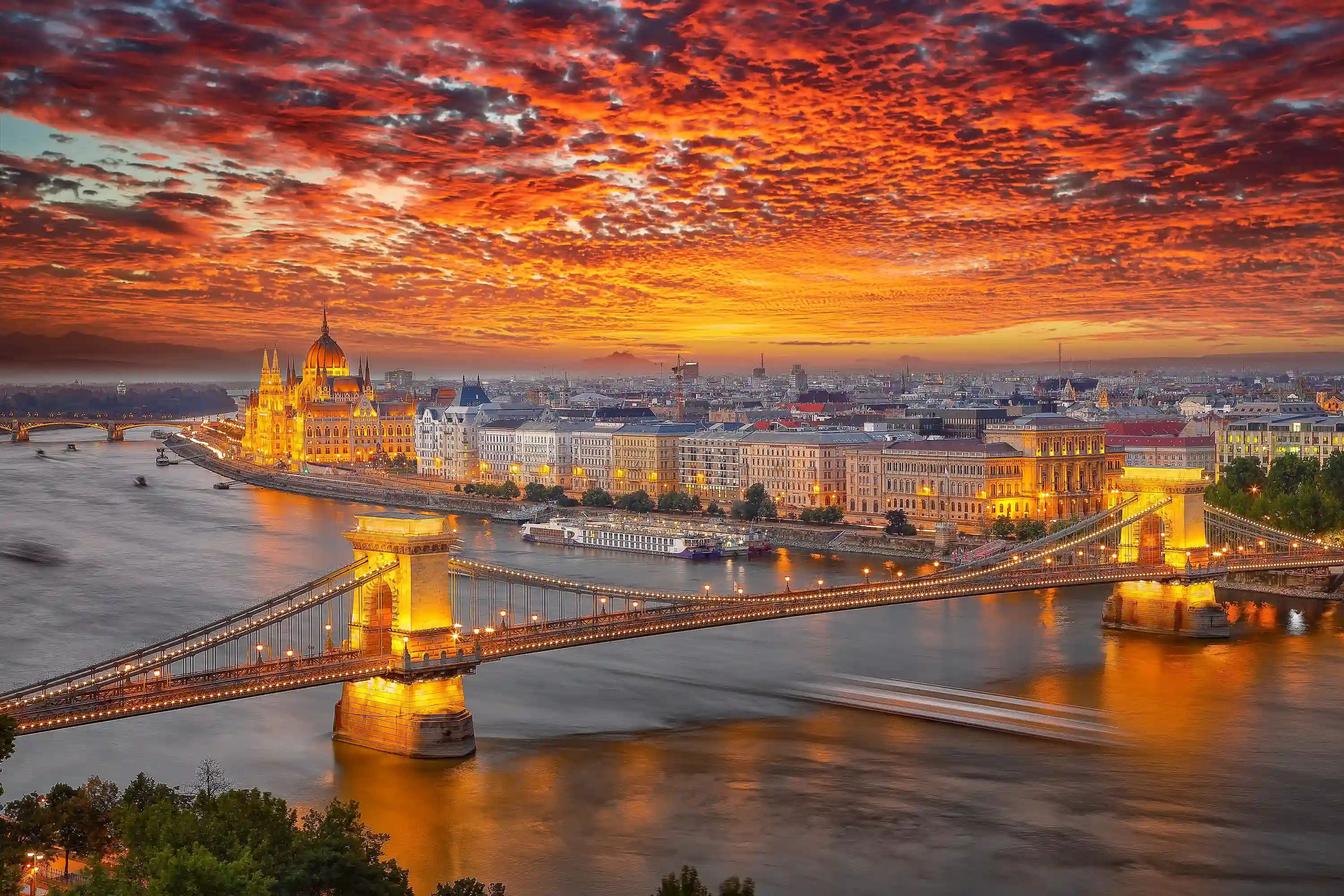 Budapest Hungary, beautiful buildings below an orange sky