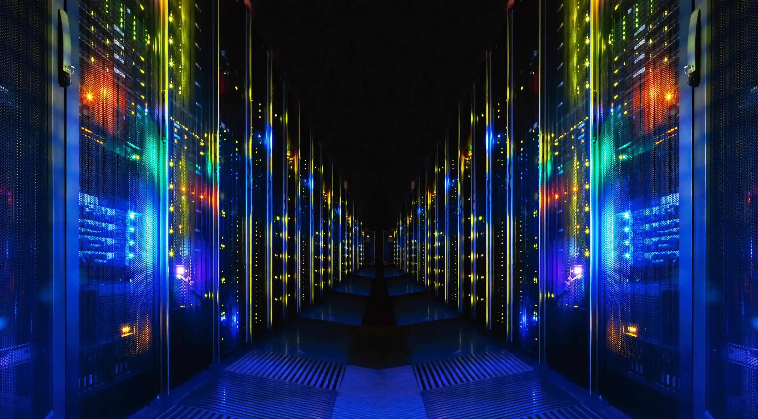Dark corridor between data banks with operational lights