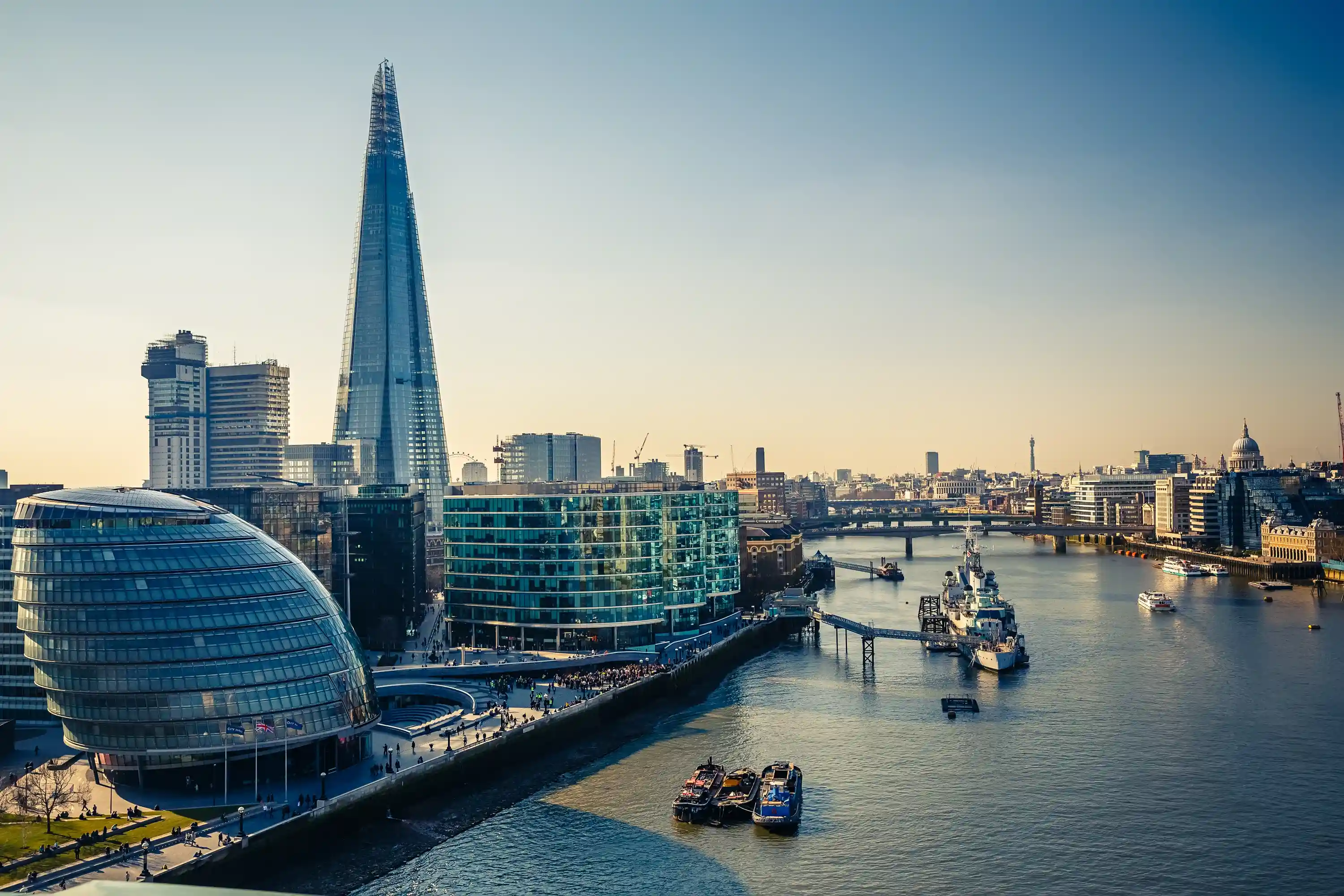 London, Shard and glass buildings to the left of The Thames